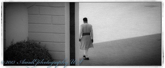 A guard walking by the Clock Tower (I think, correct me if I am wrong).